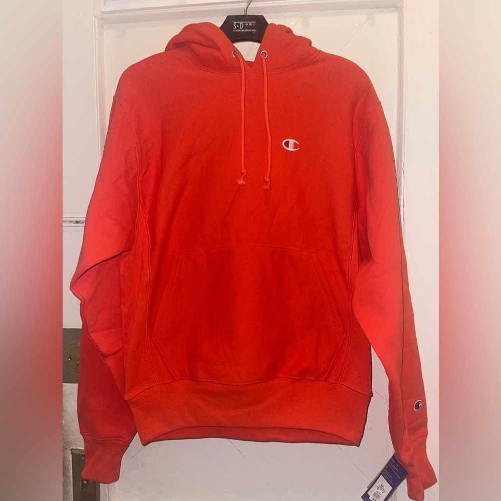 CHAMPIONS REVERSE WEAVE DYNAMIC ORANGE HOODIE